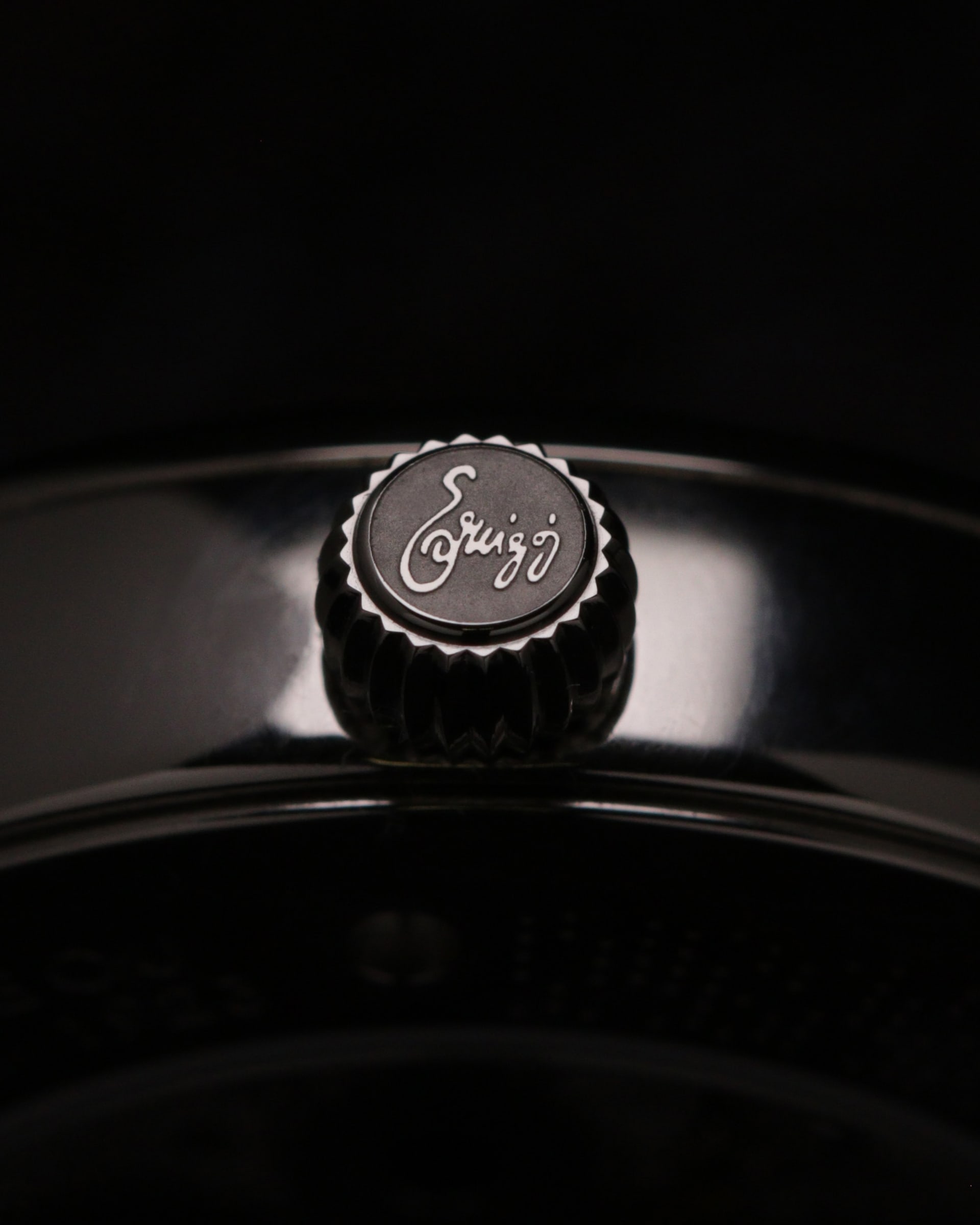 The crown of JACQUARD, engraved with the Ercigoj signature